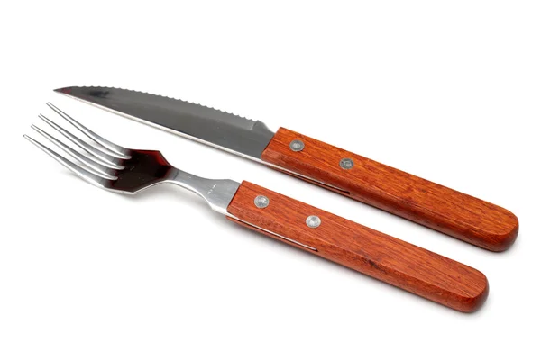 Stainless knife and fork on white background — Stock Photo, Image