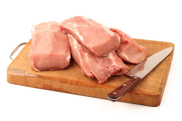 Frisches rohes Schweinefleisch auf weißem Hintergrund — Stockfoto