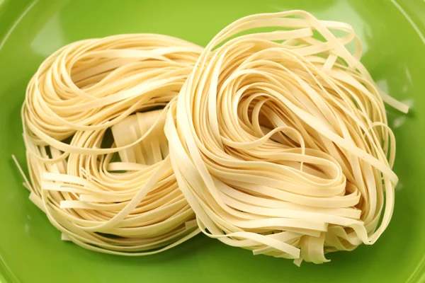 Macarrão italiano tagliatelle ninho — Fotografia de Stock