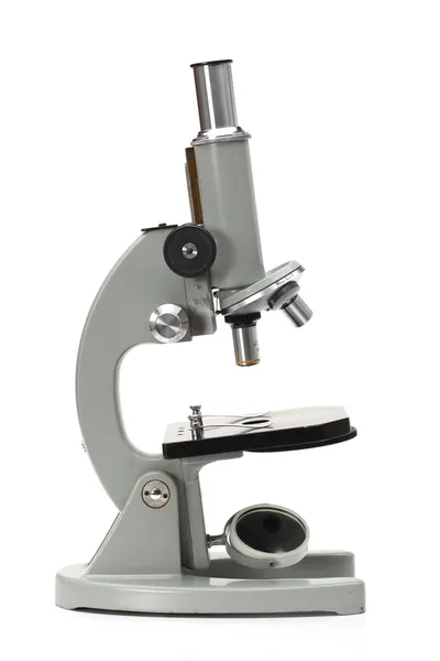 Old microscope isolated on white background — Stock Photo, Image