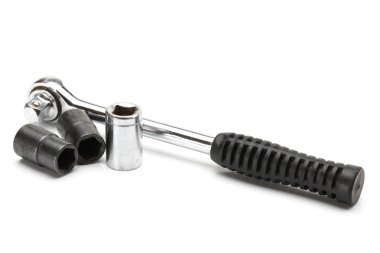 beyaz zemin üzerine alyan somun anahtarı