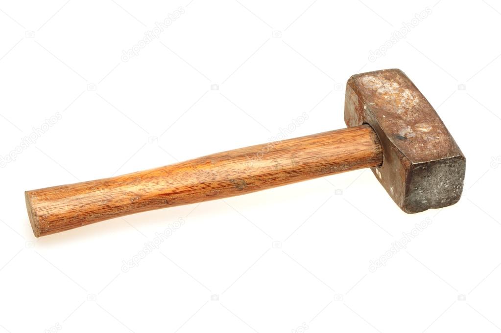 Old sledge hammer with wooden handle on a white background