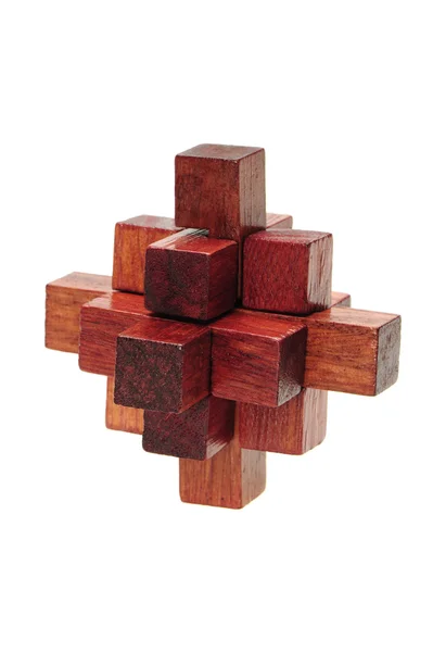 Wooden puzzle over white background — Stock Photo, Image