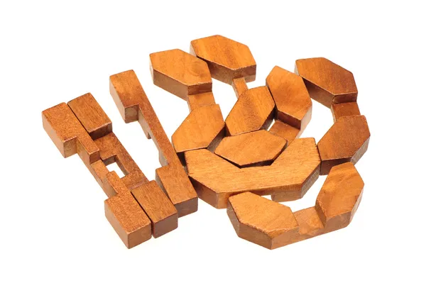 Wooden puzzle over white background — Stock Photo, Image