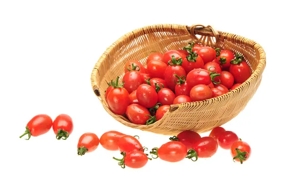 Tomate cereza pequeño sobre fondo blanco de cerca —  Fotos de Stock