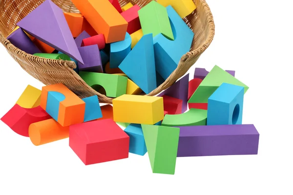 O castelo de brinquedo de blocos de cor isolados em um fundo branco — Fotografia de Stock