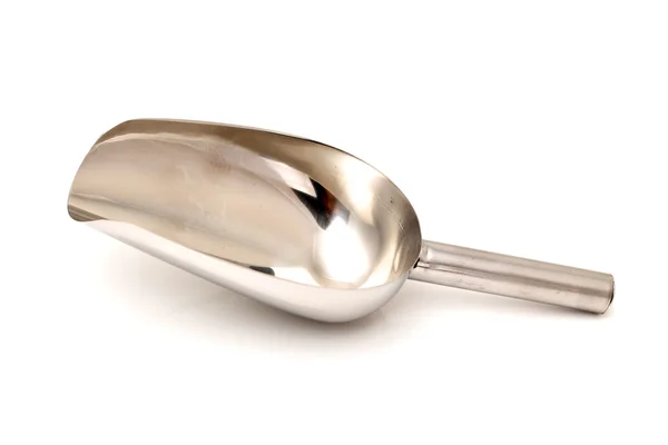Metal flour scoop on a white background — Stock Photo, Image