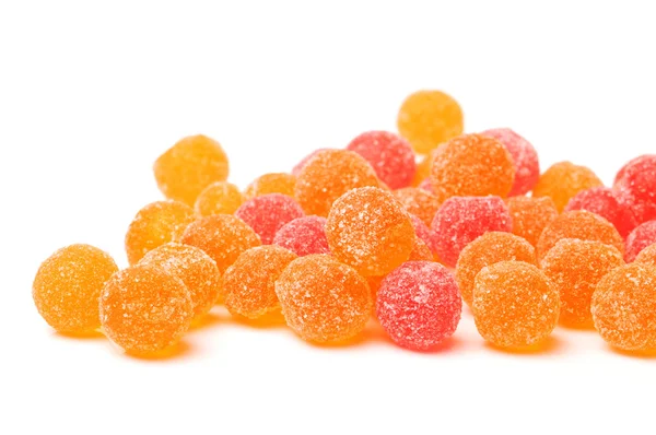 Gelatina di frutta palle colorate su uno sfondo bianco — Foto Stock