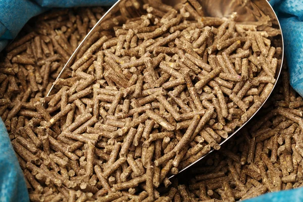 Bag of rabbit feed on white background — Stock Photo, Image