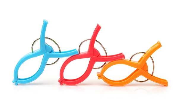 Closeup image of little colorful office clothespins isolated on a white background — Stock Photo, Image