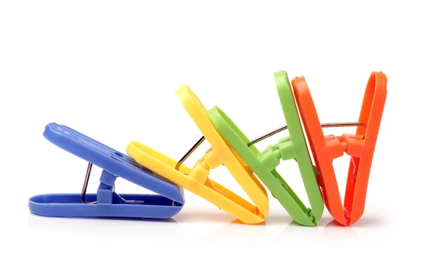 Closeup image of little colorful office clothespins isolated on a white background — Stock Photo, Image