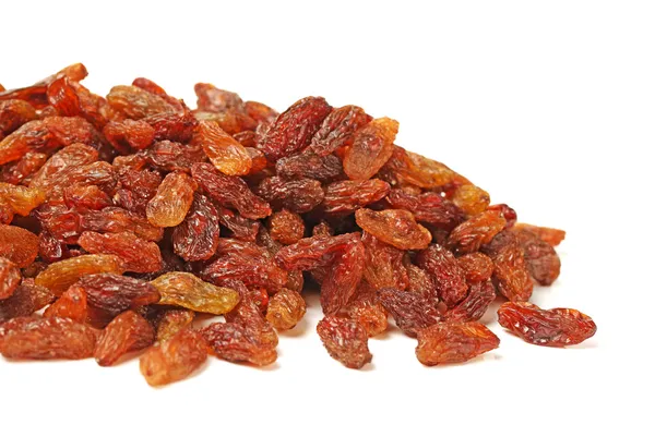 Brown raisins on a white background — Stock Photo, Image