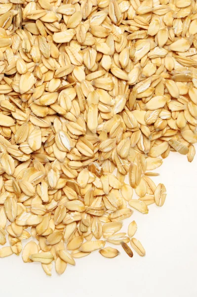 Scattered rolled oats — Stock Photo, Image