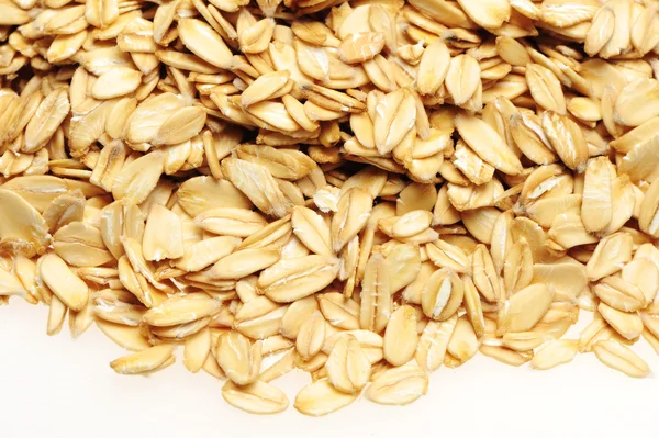 Scattered rolled oats — Stock Photo, Image