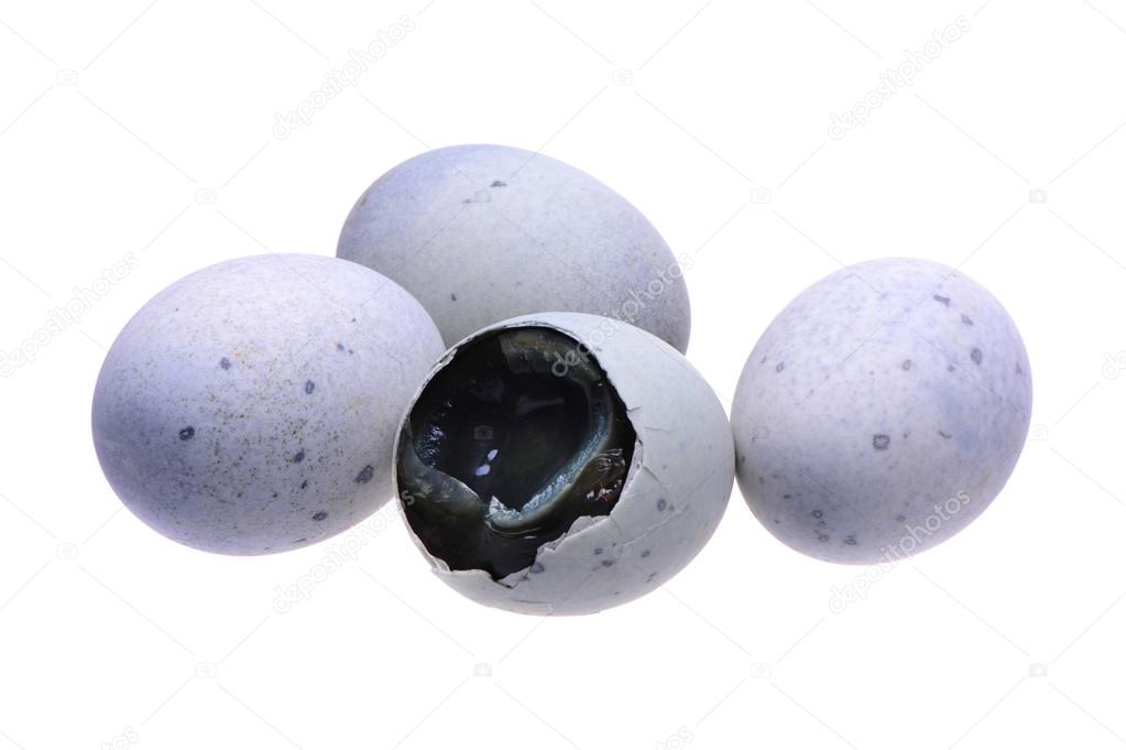 Preserved duck eggs on white background