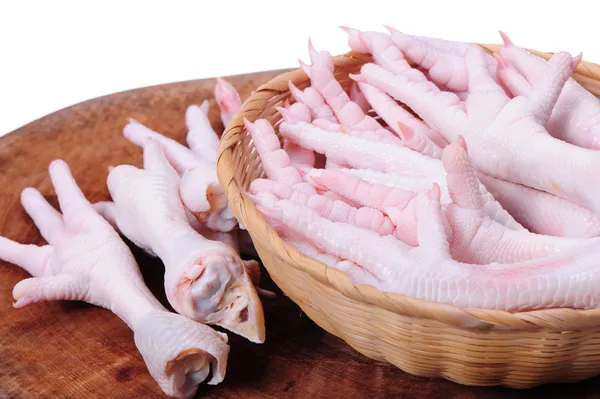 Chicken feet on white background. — Stock Photo, Image