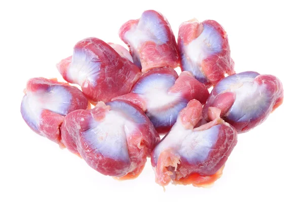 Syrové kuřecí žaludky na bílém pozadí — Stock fotografie