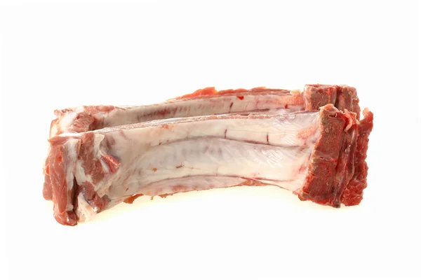 Costillas de cerdo sobre fondo blanco — Foto de Stock