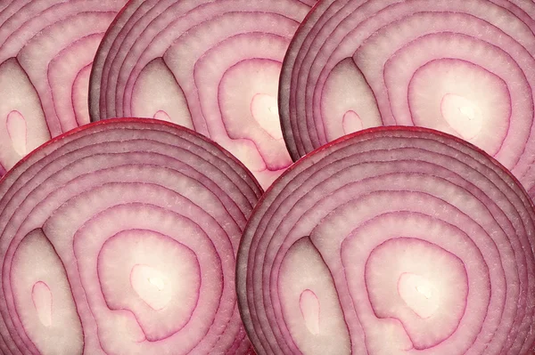 Rote Zwiebeln in Scheiben geschnitten — Stockfoto