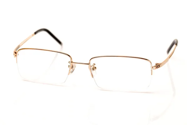 Eine Brille mit goldener Farbe für trübe Sicht — Stockfoto