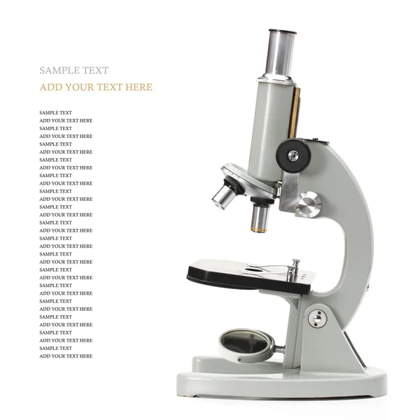 Staré mikroskop izolovaných na bílém pozadí — Stock fotografie