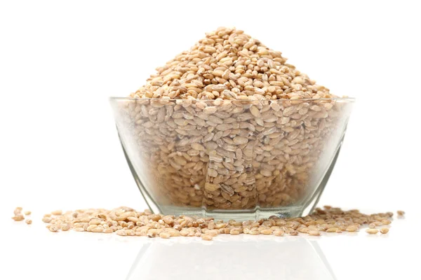 Pearl barley in glass bowl Stock Photo