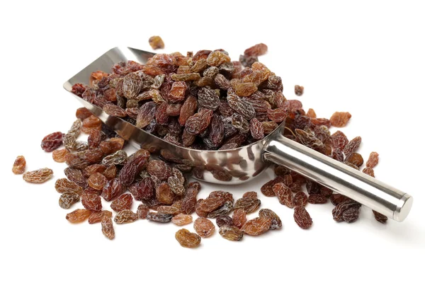 Raisins with scoop — Stock Photo, Image