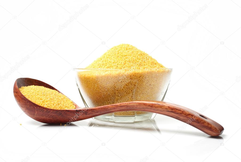 Millet  with spoon and bowl