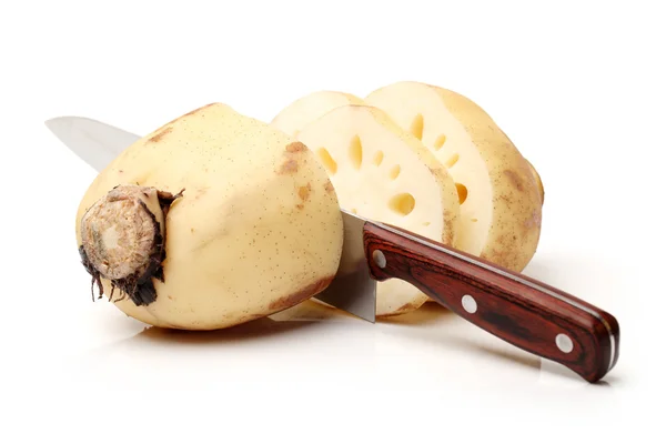 Lotus root with knife — Stock Photo, Image