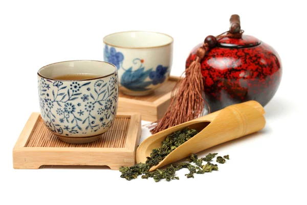 Porcelánové hrneky a čaj — Stock fotografie