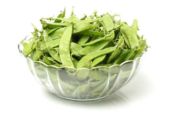 Peas in glass bowl — Stock Photo, Image