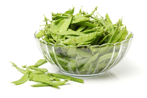 Peas in glass bowl — Stock Photo, Image