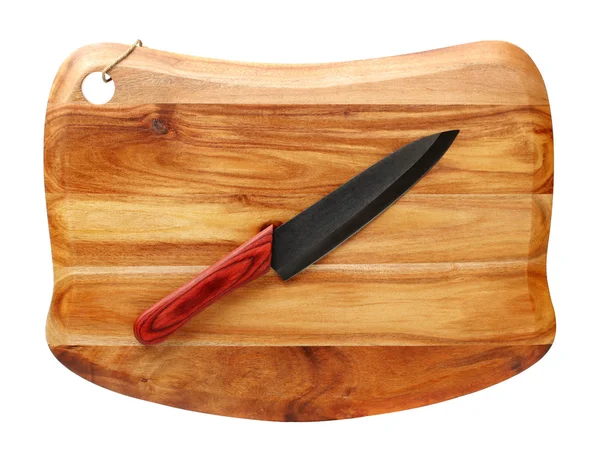 Knife on cutting board — Stock Photo, Image