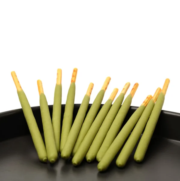 Sticks in tray — Stock Photo, Image