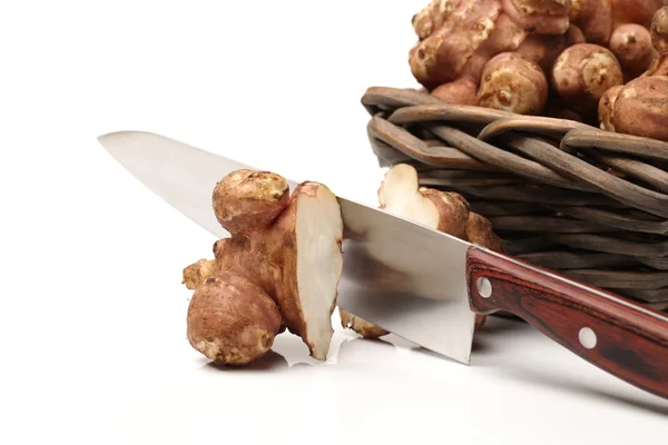 Artichoke with knife — Stock Photo, Image