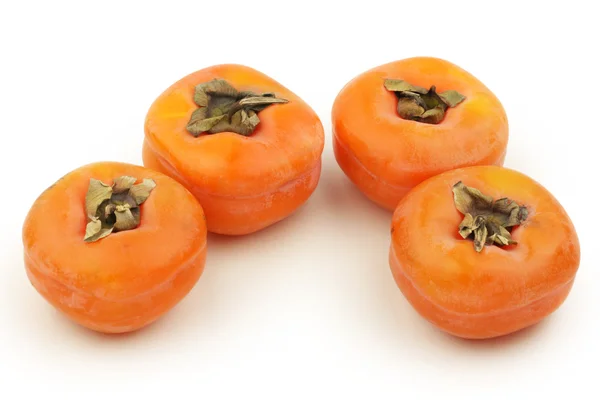 Świeże persimmons — Zdjęcie stockowe