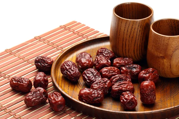 Red dates in  plate — Stock Photo, Image