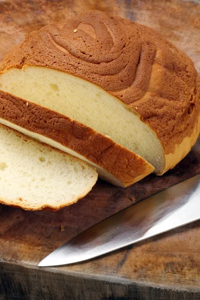 Bread with knife — Stock Photo, Image