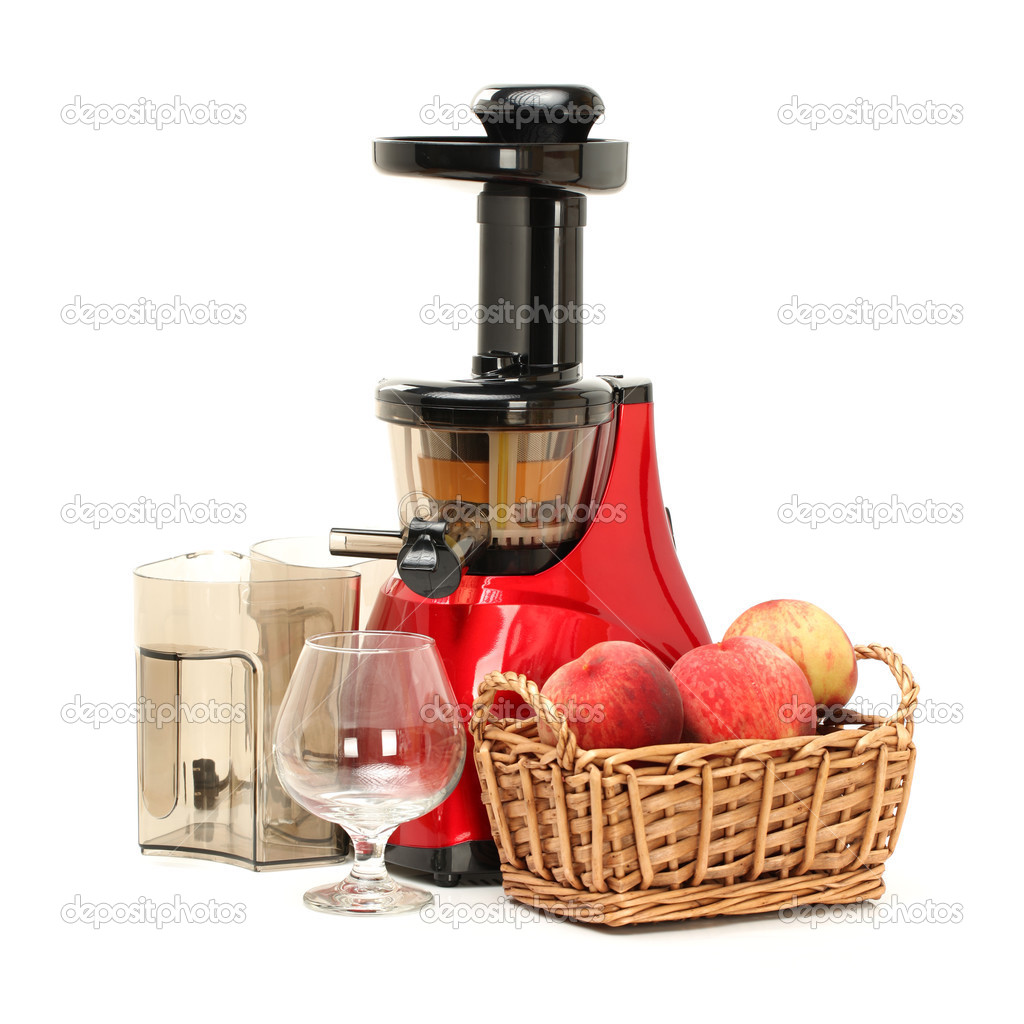 Slow juicer with peaches