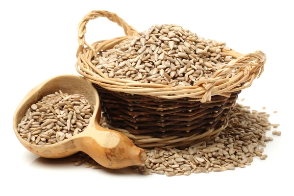 Sunflower seeds in dishware — Stock Photo, Image