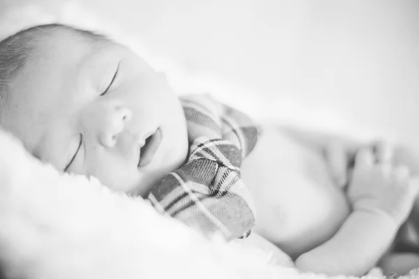 Newborn with bow — Stock Photo, Image