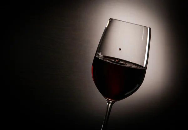 Wine on the black background — Stock Photo, Image