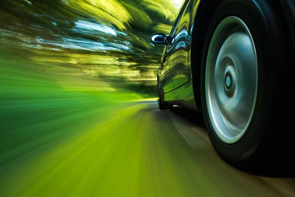 View of black luxury sedan driving fast. — Stock Photo, Image