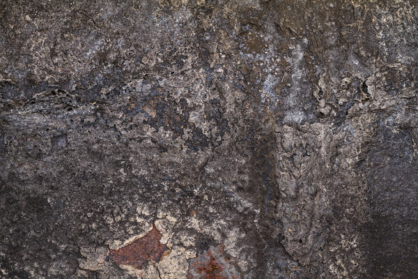 Ржавый металл с остатками сгоревшей пищи
