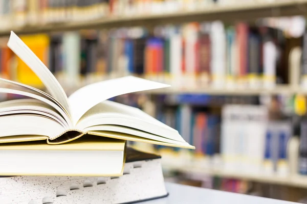 Textbook open in school setting — Stock Photo, Image