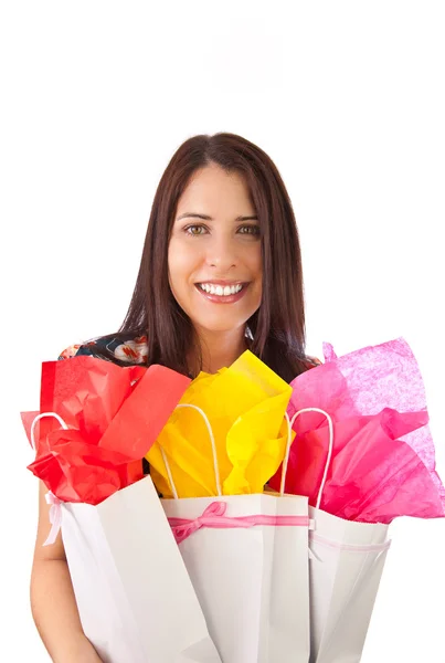 Mujer joven sosteniendo bolsas de regalo Imagen De Stock