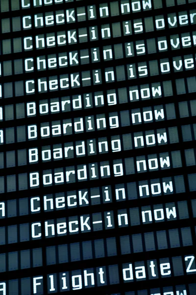 Flight arrival board in airport, closeup. — Stock Photo, Image