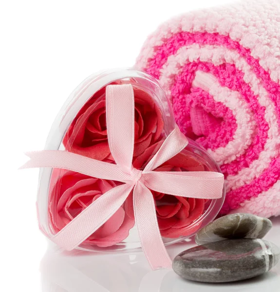 Soap foam roses in a heart-shaped box on bath towels — Stock Photo, Image