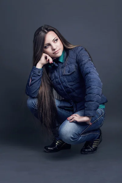 Young casual woman in a jacket — Stock Photo, Image