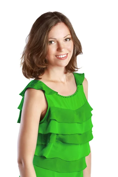 Mujer joven en vestido verde sonriendo — Foto de Stock